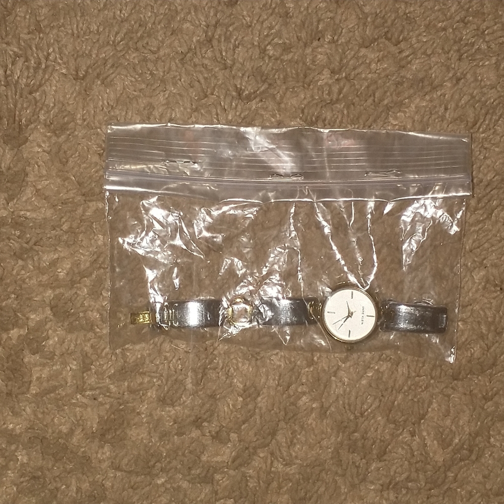 Small stainless steel/ gold watch